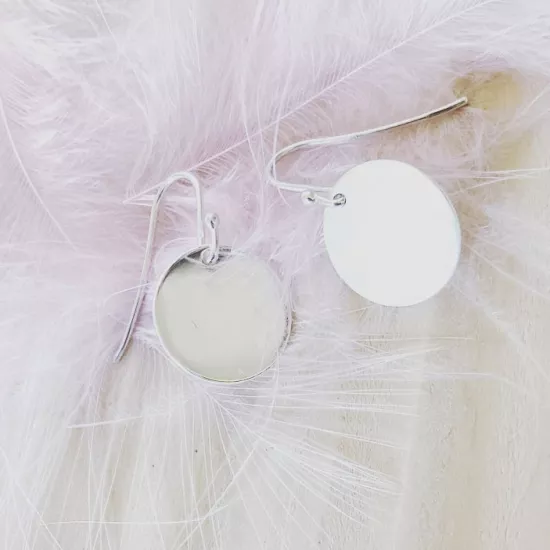Boucles plaques rondes pendantes