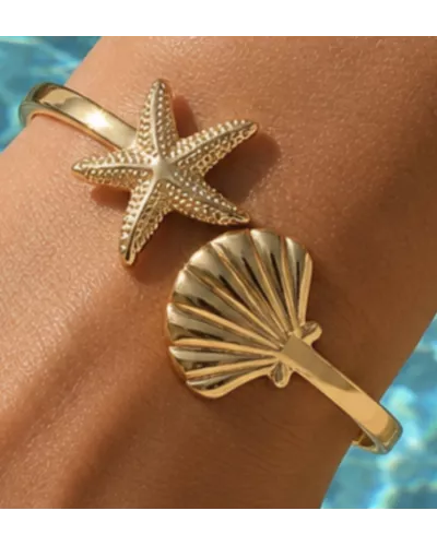 Jonc Naïa en acier inoxydable doré – Bracelet étoile de mer et coquillage | My Poupi