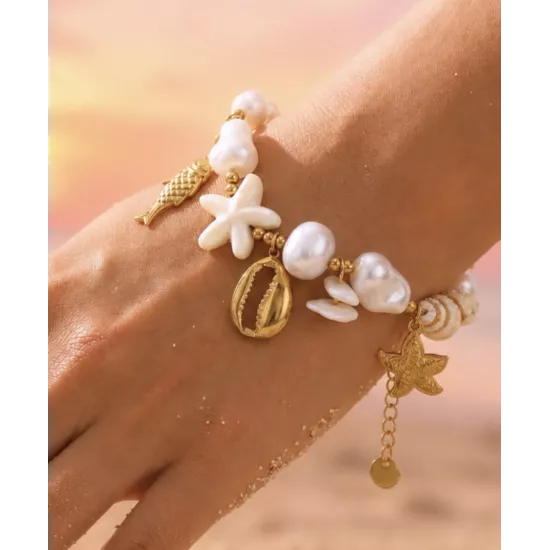 Bracelet Maïna en acier inoxydable doré – Bracelet charms coquillage, poisson et étoile de mer | My Poupi