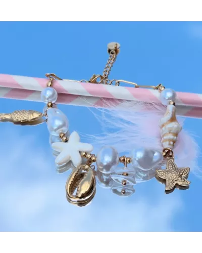 Bracelet Maïna en acier inoxydable doré – Bracelet charms coquillage, poisson et étoile de mer | My Poupi