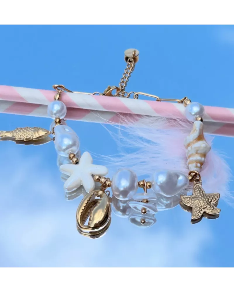 Bracelet Maïna en acier inoxydable doré – Bracelet charms coquillage, poisson et étoile de mer | My Poupi